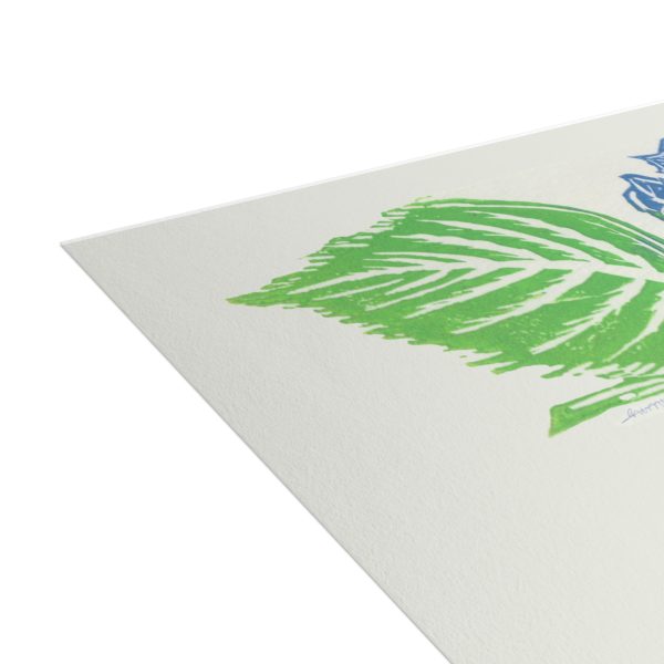 Green and blue leaf print on white paper