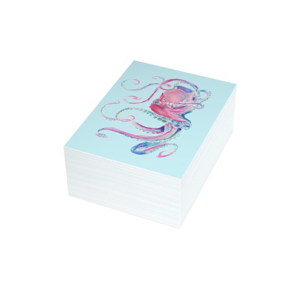 Stack of octopus art prints