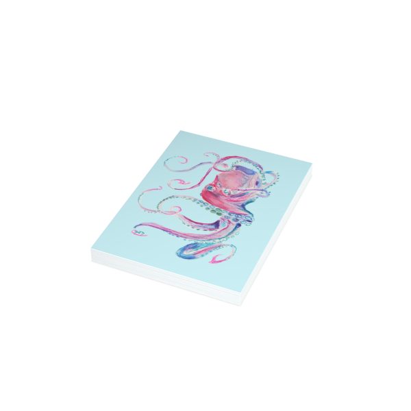 Colorful octopus illustration on blue background notebook